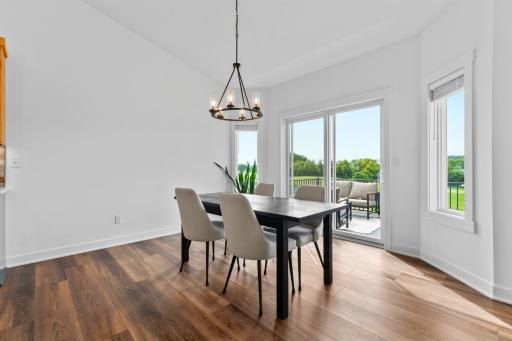 Patio access, with flanking windows to allow more light in.