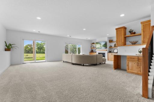 LL flex space with beverage bar and patio access.