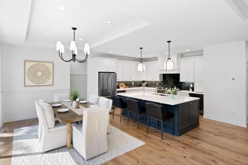 The massive center island in the kitchen is the heart of this home.