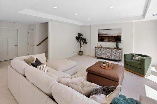 This Rec Room can accommodate the largest sectional sofas on the market so everyone has a seat for movie night!