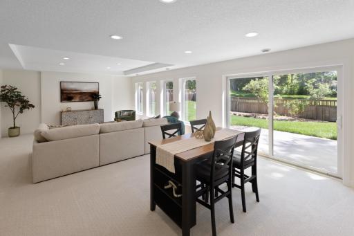 So much glass connects those inside with those outside! The massive sliding glass door opens to the patio area.