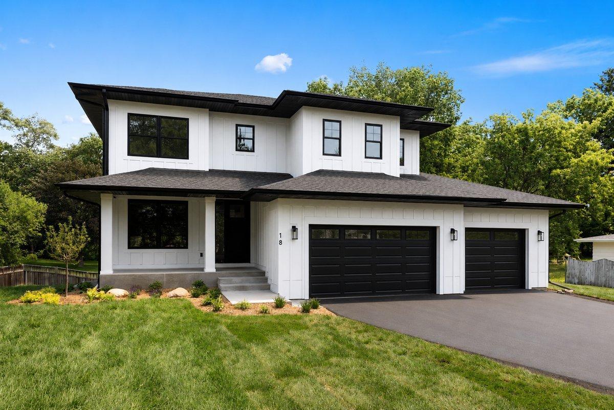 Welcome to 18 Balsam Ln N! This new home built by Boone Builders offers stylish design in an amazing location only 15 minutes to downtown Minneapolis and minutes from shops & restaurants at Ridgedale Mall. *Garage doors virtually rendered*