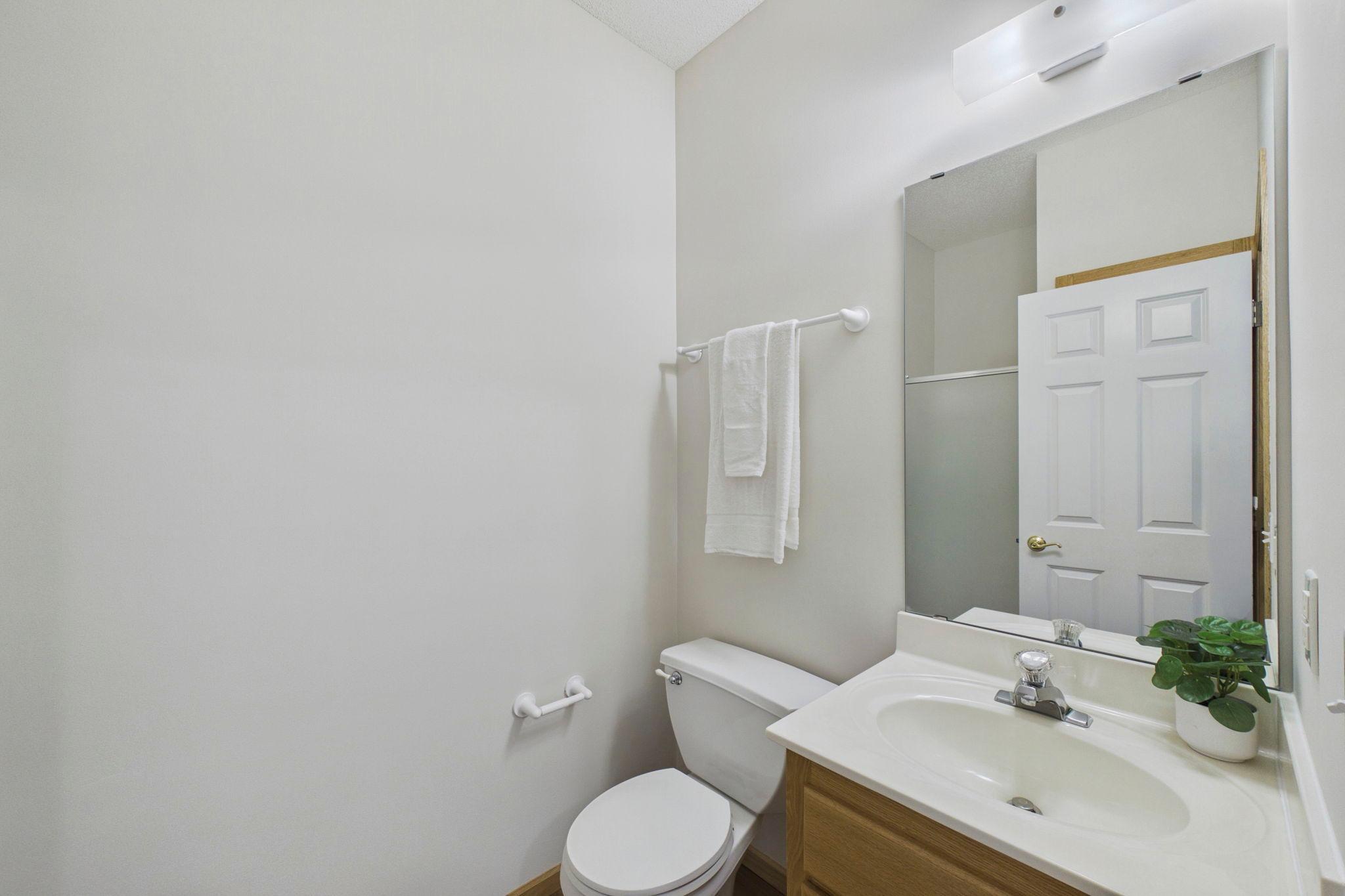 Second main-level bathroom features a convenient walk-in shower.