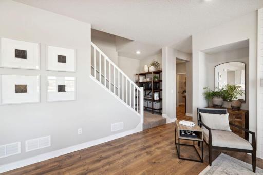 Let's head upstairs! Photo is of previously built model home, finishes, selections, and colors may vary.