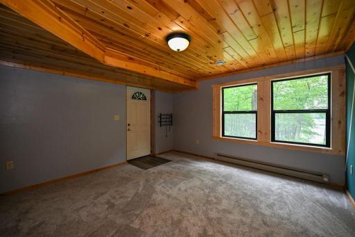 39-Lower Level Bedroom w door to hot tub.jpg