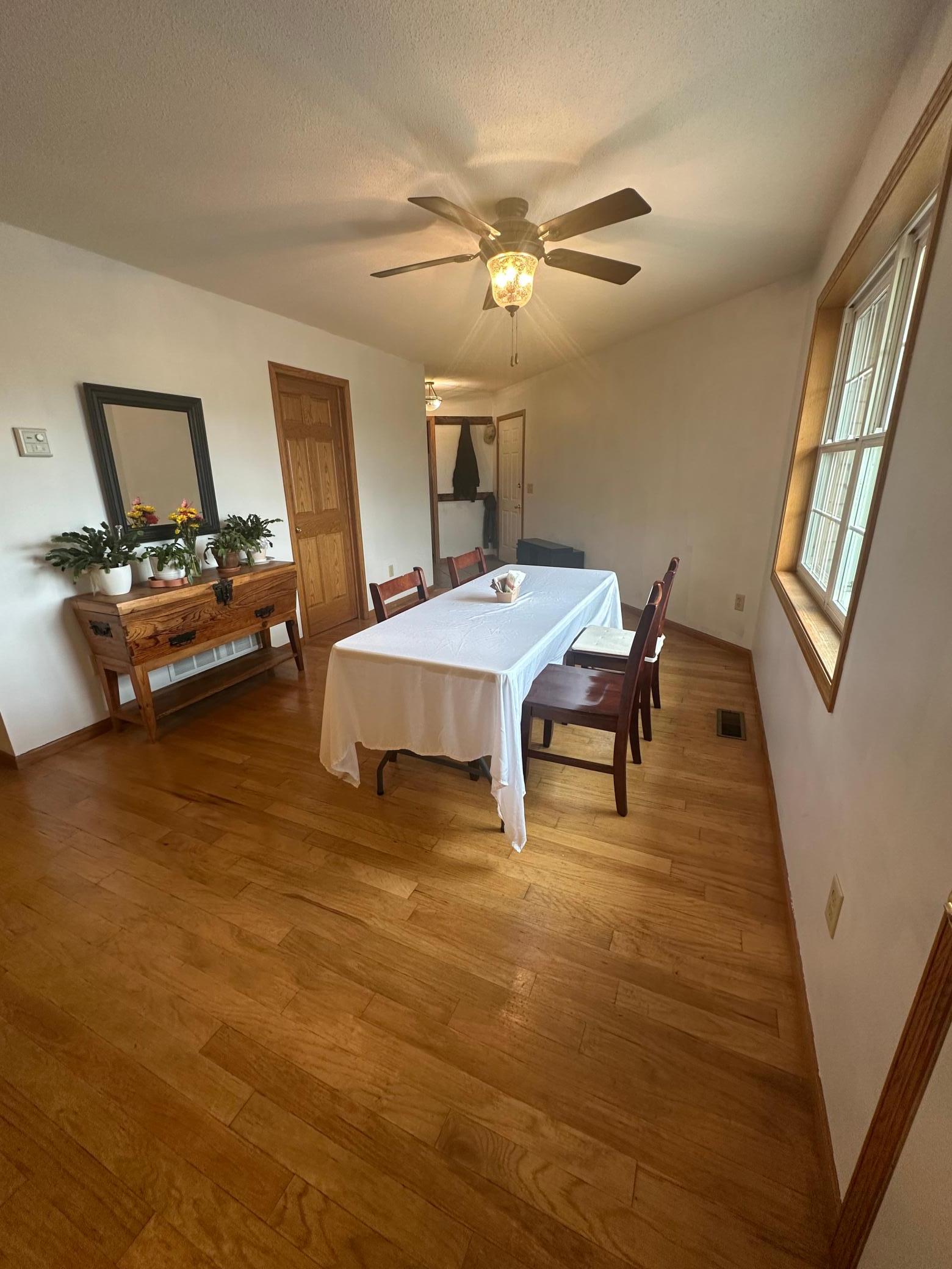 You can use this space as a dining room, sitting room, game room, office. Staged to show different way space can be used