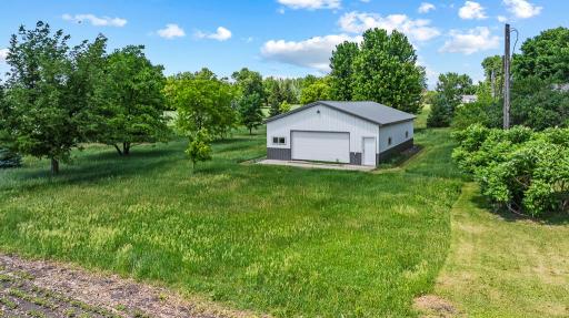 Lot extends behind the house and features a nice shop for your storage, business, or hobbies