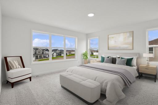 (Photo of a decorated model, actual finishes will vary) Relax in the primary suite!