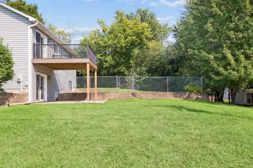 Large side and rear yard for kids, pets and adults to play. There is a separate fenced area for pets or a dedicated garden.