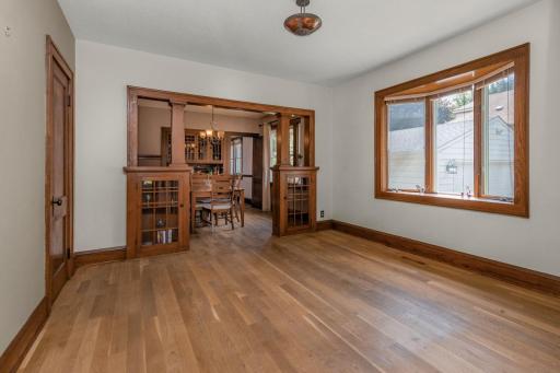Living Room with Harwood Floors and Built in Bookshelves. All Natural Wood Work.