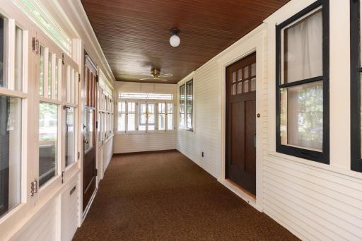 Front Three Season Porch with Rustic Charm and Wood Ceiling with Ceiling Fans