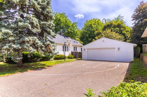 Oversized Two Car Garage with Driveway Basketball Hoop
