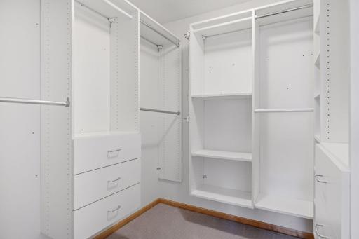 Spacious Walk-In Closet with Beautiful Custom Built-Ins
