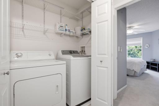 Full-Size Laundry Conveniently Tucked Behind Closet Doors