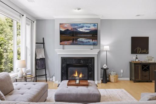 High Ceilings and Gas Fireplace Create a Warm Ambiance