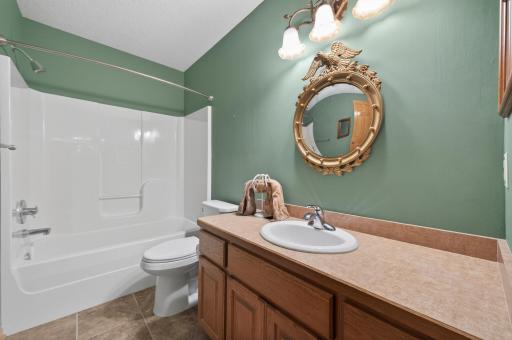 Large lower level full bath located right next to the lower level 3rd bedroom.
