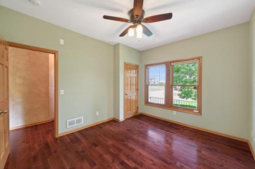 This main level 2nd bedroom offers ample room and light as well as closet space.