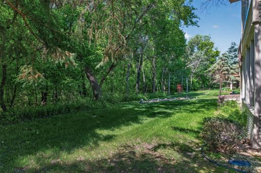Large back yard invites quiet purposeful moments of reflection and relaxation.
