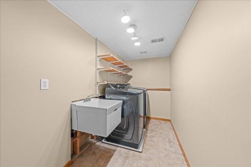 View of Laundry Room next to Full Bathroom