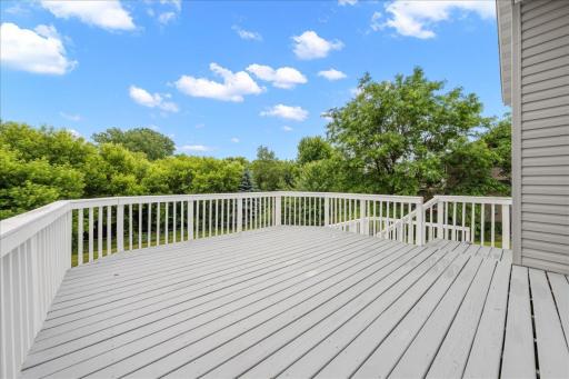 View of the HUGE two tier deck off of the living room and Family room areas!