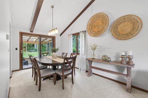 Enjoy seamless indoor-outdoor living in this inviting dining room.