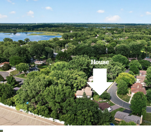 A stunning drone view showcasing this home perfectly situated in a highly desirable locationâoffering convenience, charm, and a setting youâll love coming home to.