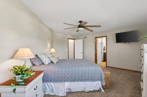 Large primary suite with room for a sitting area and private bath access.