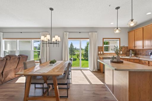 Spacious dining area adjacent to the kitchen and living room.