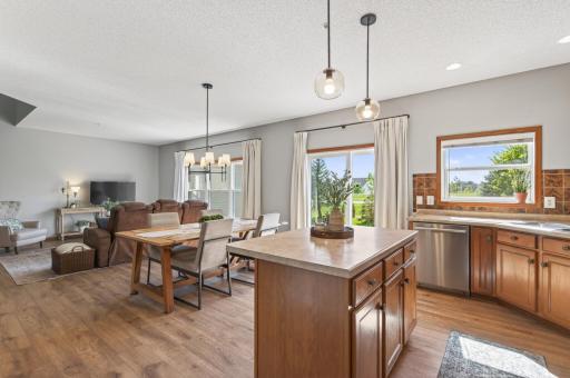 Kitchen with window over sink and views of the backyard.