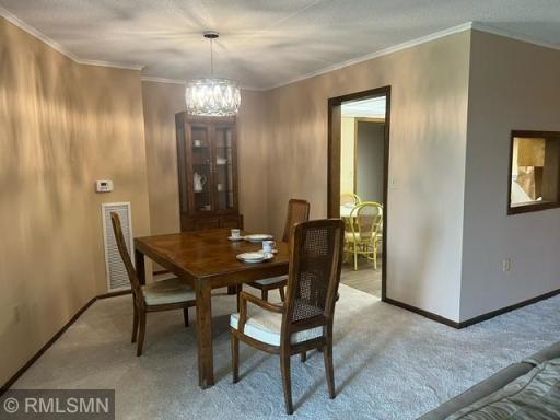 Formal Dining Room adjoins Eat-In kitchen.