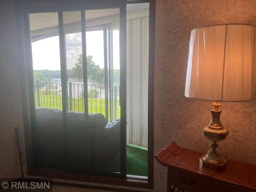 Screened Balcony access through 2nd Bedroom sliding glass door.