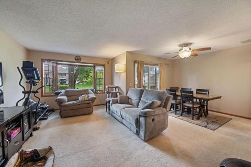 Open floor design with huge bayed window and sliding glass door for lots of natural sunlight!
