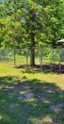 fenced area off garage.jpg