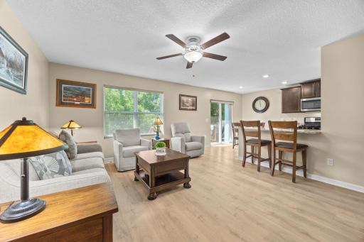 Main level living room with newly installed LVP flooring.