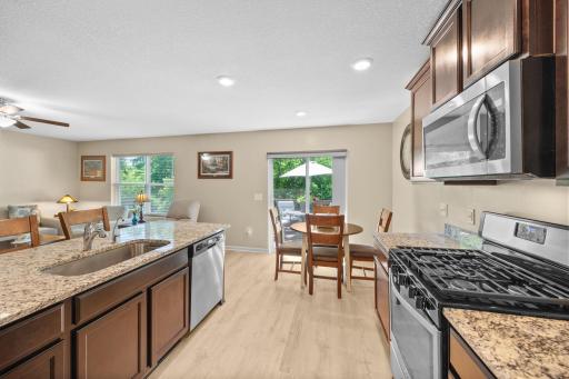Granite countertops, SS appliances, & espresso cabinetry.