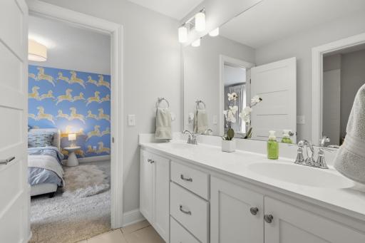 Adjoining bathroom on upper level