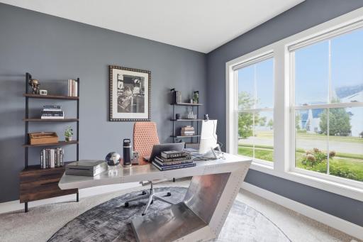 Beautiful main level office offering large windows and a sliding barn door
