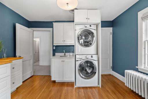 Convenient second-level laundry with a sink added in 2015