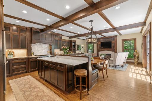 Updated kitchen features hardwood floors with radiant heat