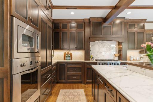 Custom cabinets, marble counters, Sub-Zero refrigerator, Viking wall oven and microwave