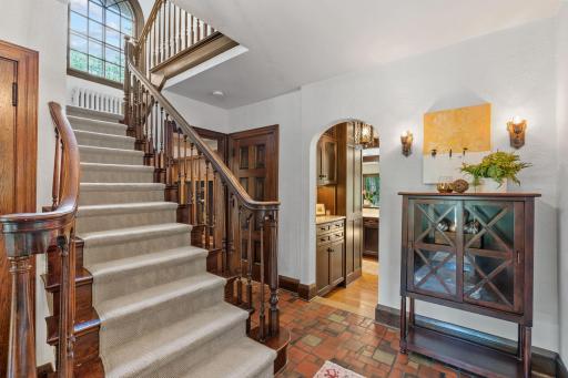 Restored, sweeping staircase to the upper levels