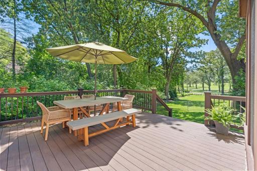 Step out back onto the maintenance-free Trex deck overlooking the 8th hole on Interlachen Golf Course
