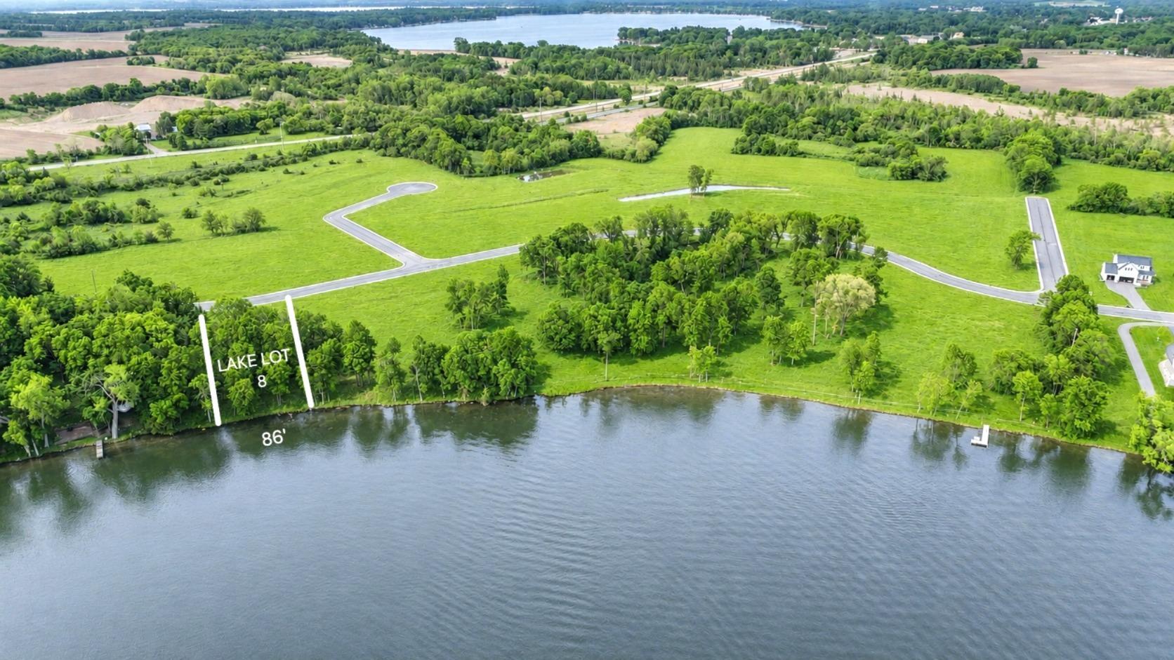 86 feet of private sandy lakeshore on Lake John.
