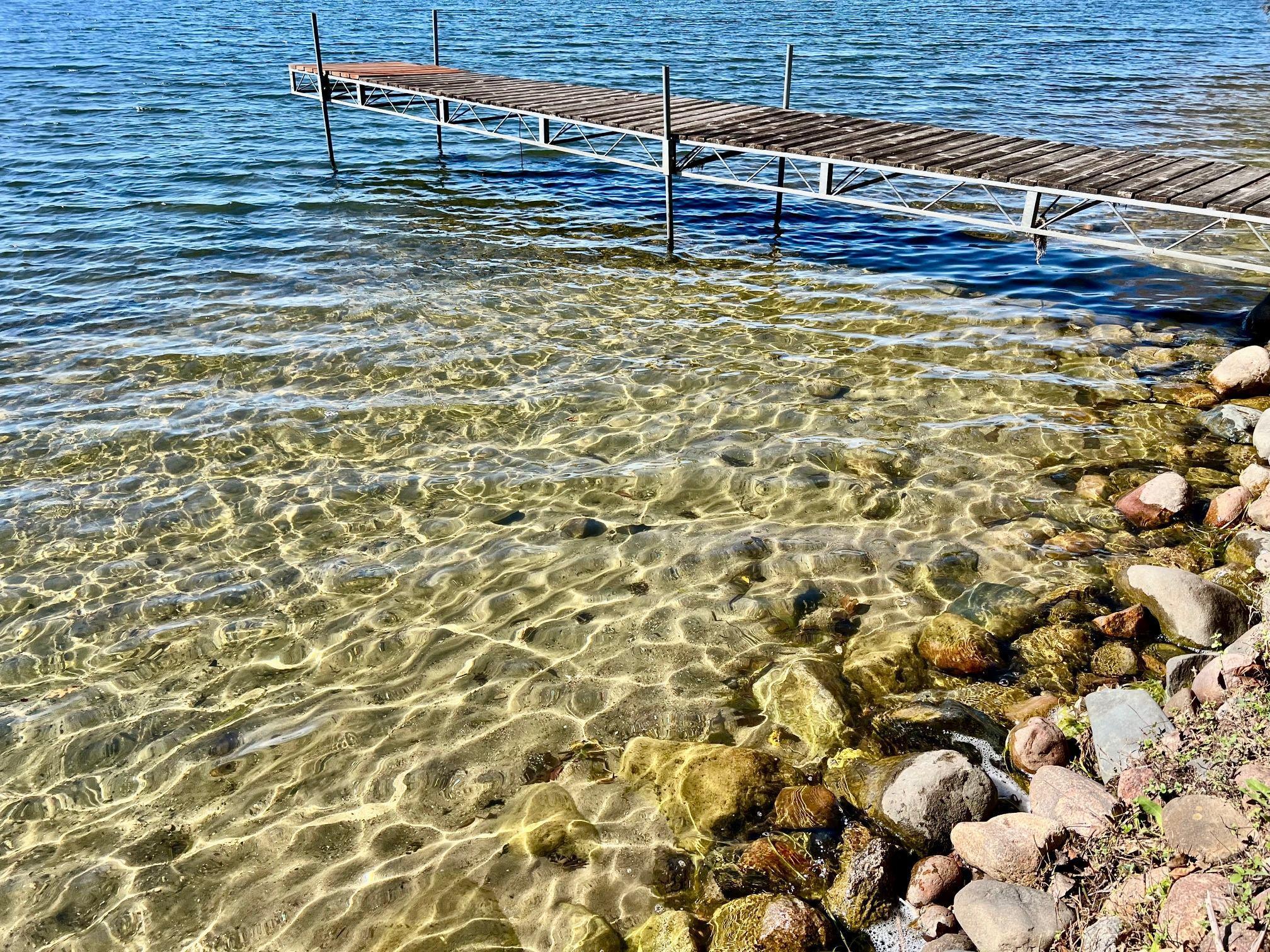 Level hard sand bottom lakeshore!