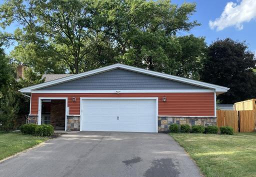 New driveway and insulated garage door in 2025.