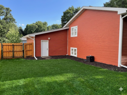 Double-gated fence and a convenient back door from the garage for quick, easy access to the backyard.