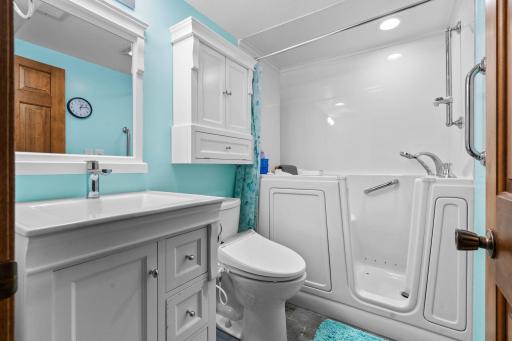 3/4 bathroom in the lower level with new walk-in shower.