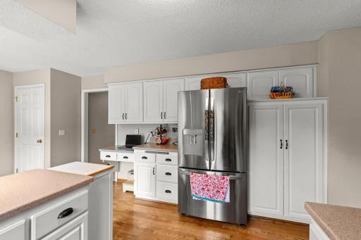 Abundance od cabinetry. Stainless steel appliances, convenient desk nook.