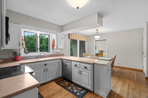 Open-concept design offers exceptional flow for everyday living and entertaining, complemented by both formal and informal dining spaces to accommodate gatherings large and small.