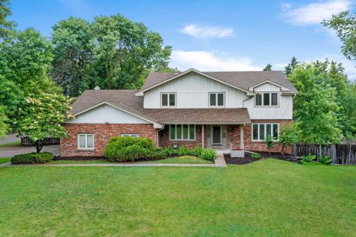 Rare opportunity in highly sought-after Wayzata School District! Situated on a beautiful corner lot, this spacious 5-bedroom, 4-bath Plymouth home features a finished walkout lower level and a spacious, versatile floor plan.